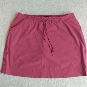 Athletic skirt with attached shorts (skort)